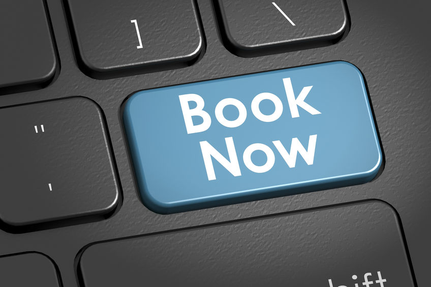 Keyboard with a blue 'Book Now' button replacing the Enter key.